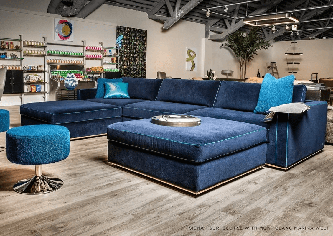 siena-suri-eclipse__07497 contemporary electric blue sectional with chaise and an aqua welt and stainless steel base
