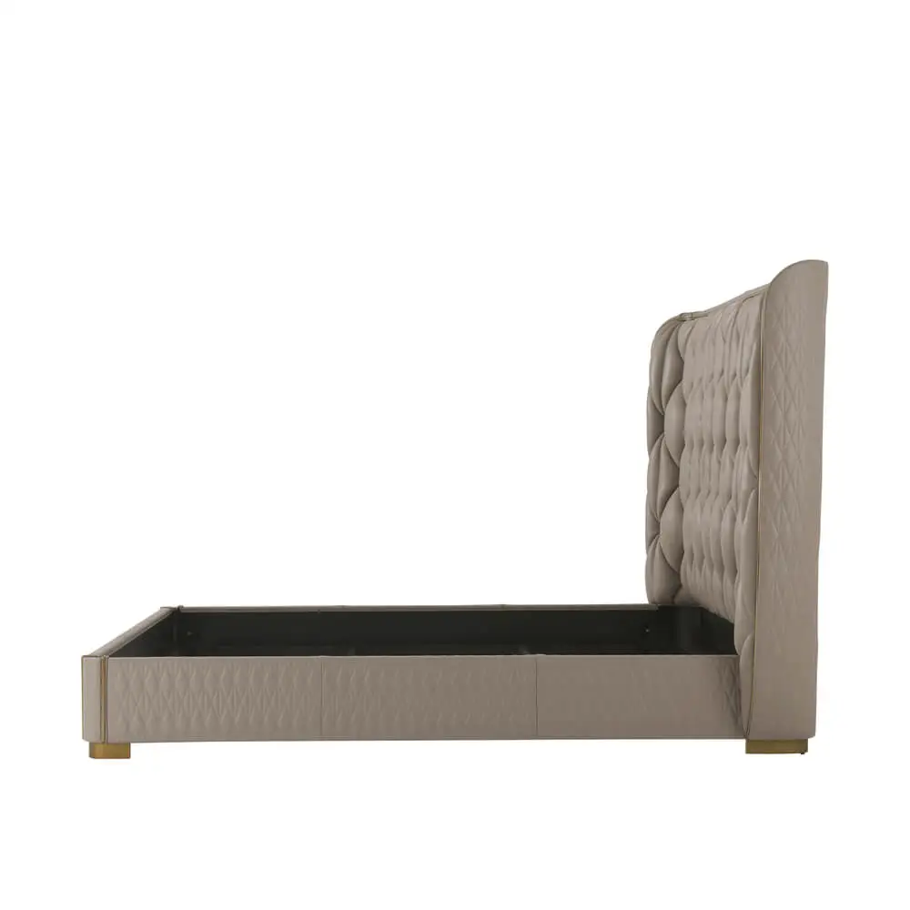 Quilted taupe leather king bed side profile.