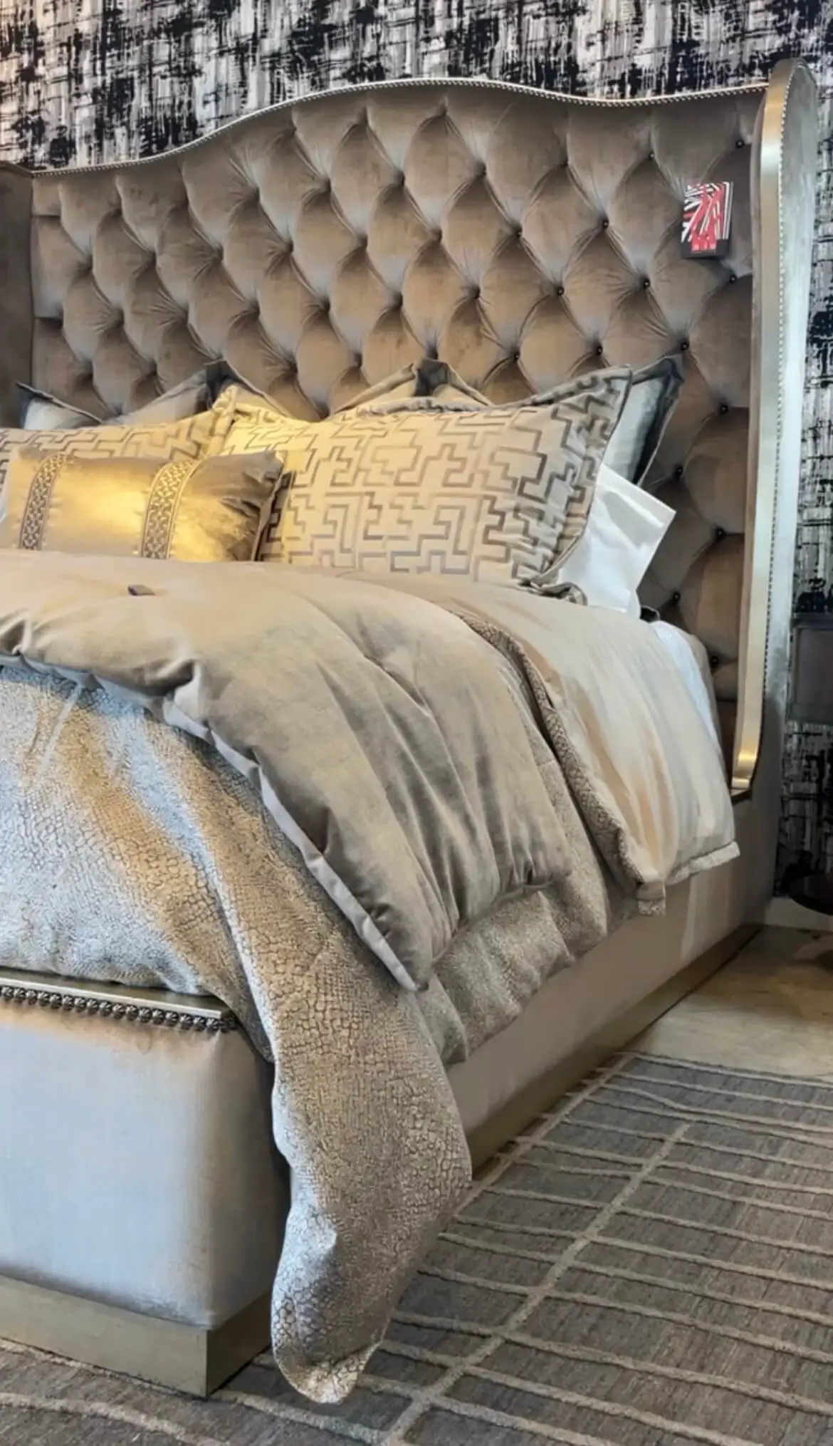 a closeup if the traditional palo alto bed by marge carson in a taupe fabric