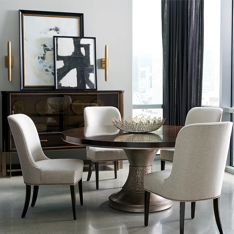 moderne1 Moderne dining table Room shot all elegant chairs and showing a sideboard with dining table by Caracole